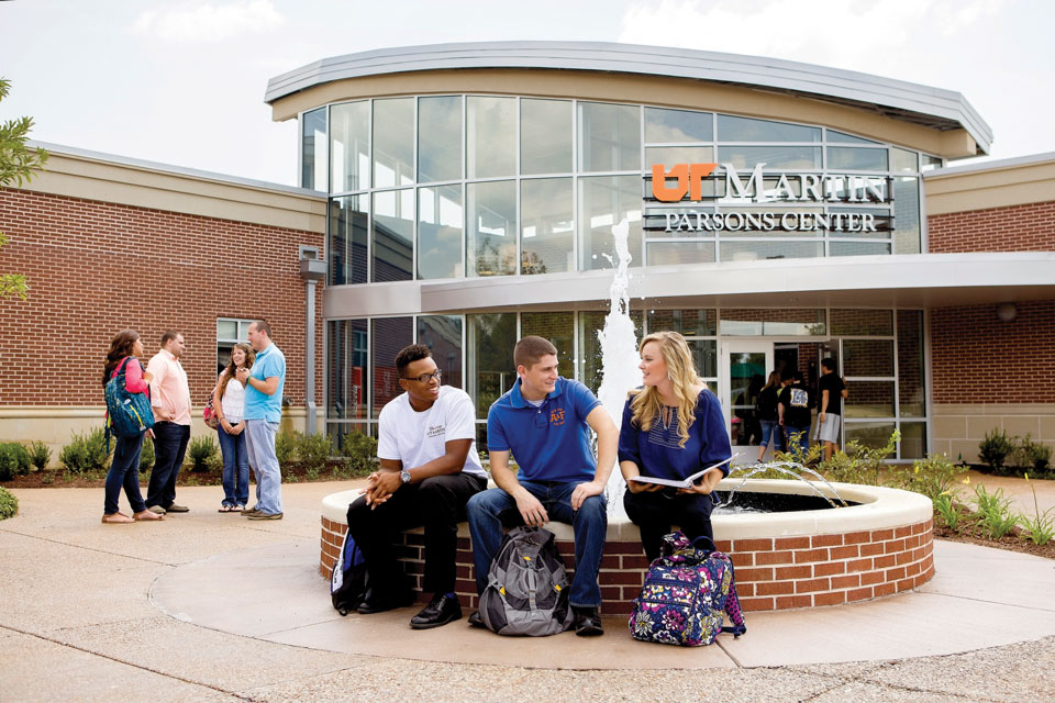 students sitting outside of Parsons Center Nursing entrance