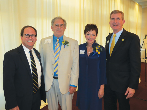 Celebrating during the annual Legends & Leaders dinner, from left, UTC Alumni Board Immediate Past President Mike Griffin (Chattanooga ’85), 2015 UTC Distinguished Alumnus Bill Landry (Chattanooga ’72), 2015 UTC Outstanding Service Award recipient Kim White (Chattanooga ’82) and UTC Chancellor Steve Angle.