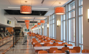 Interior of student dining facility facing windows