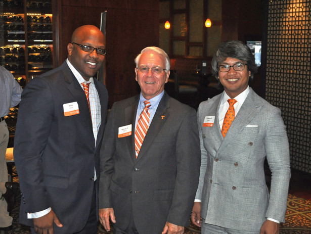 The Atlanta Alumni Chapter welcomed College of Engineering Dean Wayne T. Davis, center, for a Big 27 Orange Evening at the Buckhead Club. Robin Jones, left, and Cromwell Baun are chapter board members.
