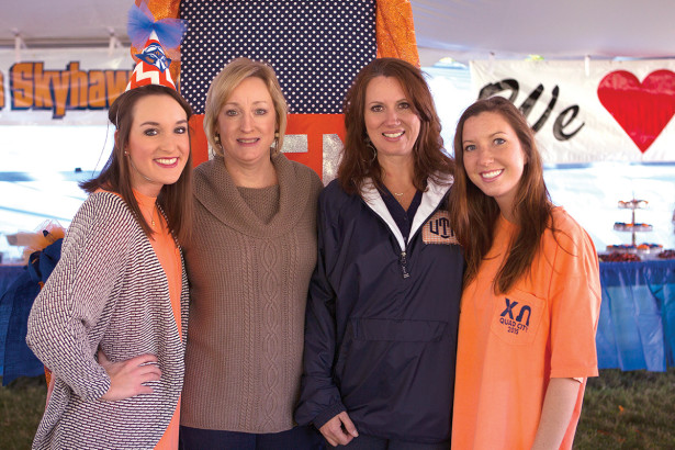From left, Mallory Staley, Starla Staley (Martin ’93), Stephanie Legens (Martin ’90) and Lakyn Bell visit the Chi Omega sorority tent at 15 UT Martin’s homecoming.