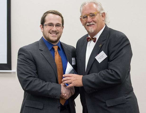 Judge John Everett Williams, right, of Huntingdon, received the inaugural Distinguished Criminal Justice Alumni Award from UT Martin’s Department of Behavioral Sciences during a September luncheon. Jesse Luke Robinson, student president of the UT Martin chapter of Alpha Phi Sigma, presented the award.
