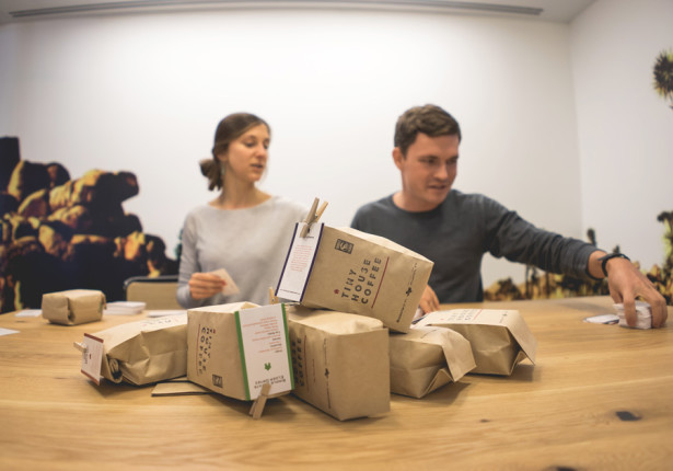 Blake and Helen package coffee beans into packaging