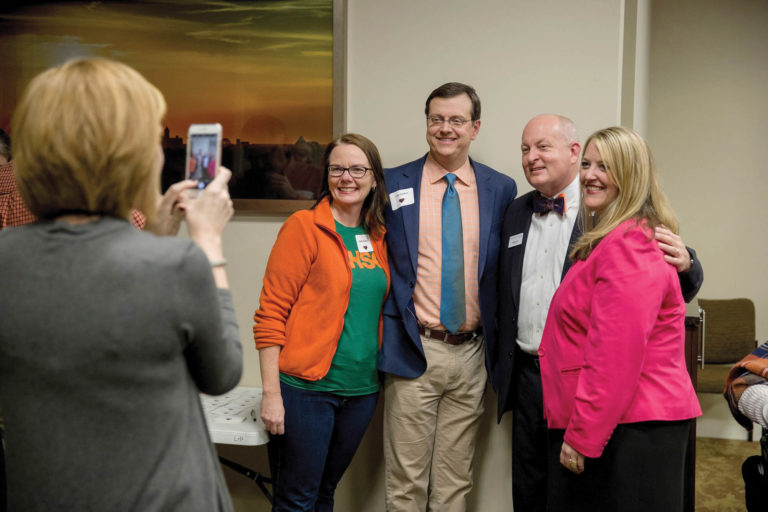 UT Martin Chancellor Keith Carver (Knoxville ’95, ’09) poses for a photo with Kathy (Martin ’91) and John Barker (Martin ’89) and UT Alumni Association president-elect Betsy Brasher (Martin ’98) in Memphis.