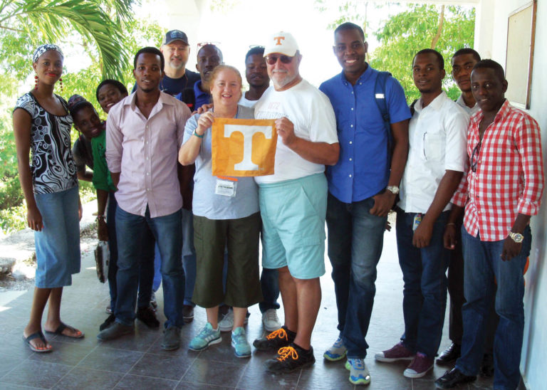Nick (Knoxville ’87) and Susan De Bonis (Knoxville ’78, ’86) with their interpreters in Haiti during an annual trip with a mobile medical team. The team treated 1,300 patients over five days in two rural villages.
