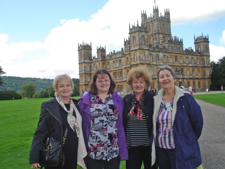 Rebecca Moss, Anne Rittenberry, Mary Stengel and Jane Womack in front of Highclere Castle