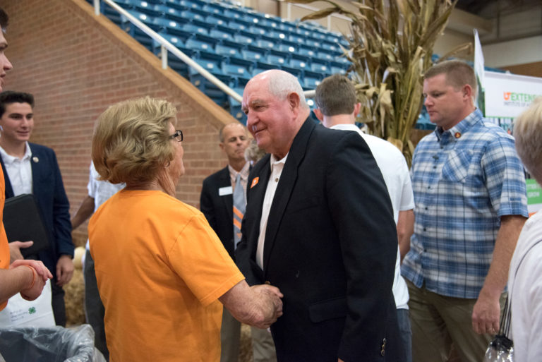 U.S. Secretary of Agriculture Sonny Perdue greets visitors in the Brehm Animal Science Arena