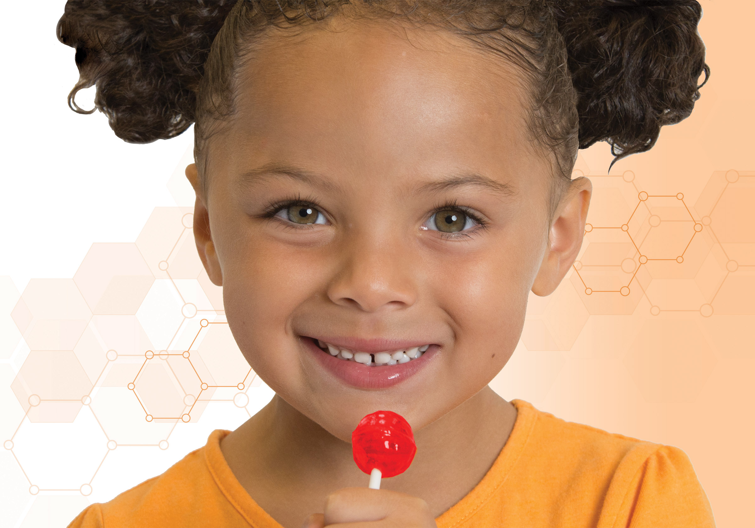 Little girl holding a bright red lollipop