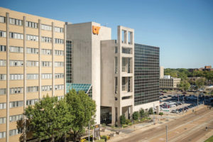 A UTHSC building in Memphis, with an orange UT icon in the side of the building