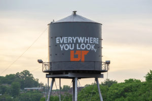 A water tower in the Old City in Knoxville, painted wih "Everywhere You Look, UT"